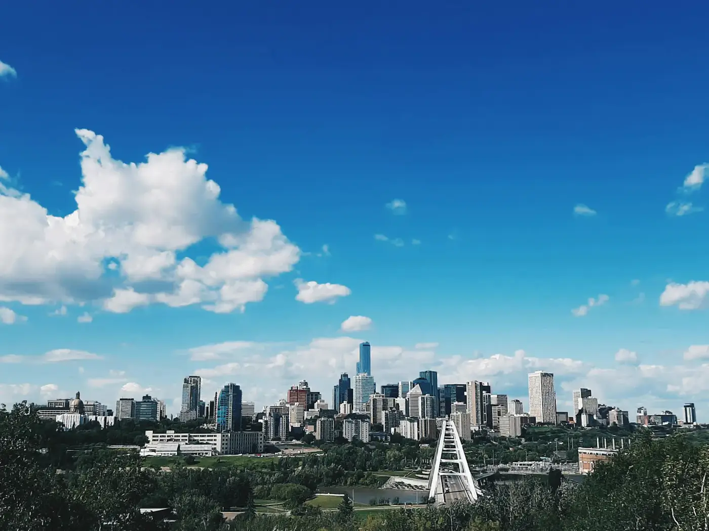 Downtown Edmonton high-rise skyline on a partly cloudy day