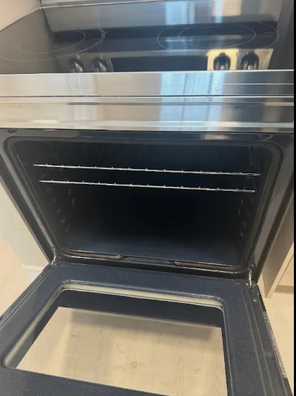 Oven interior degreased to bare enamel after a WHITEBOX move-out cleaning in Edmonton, client photo